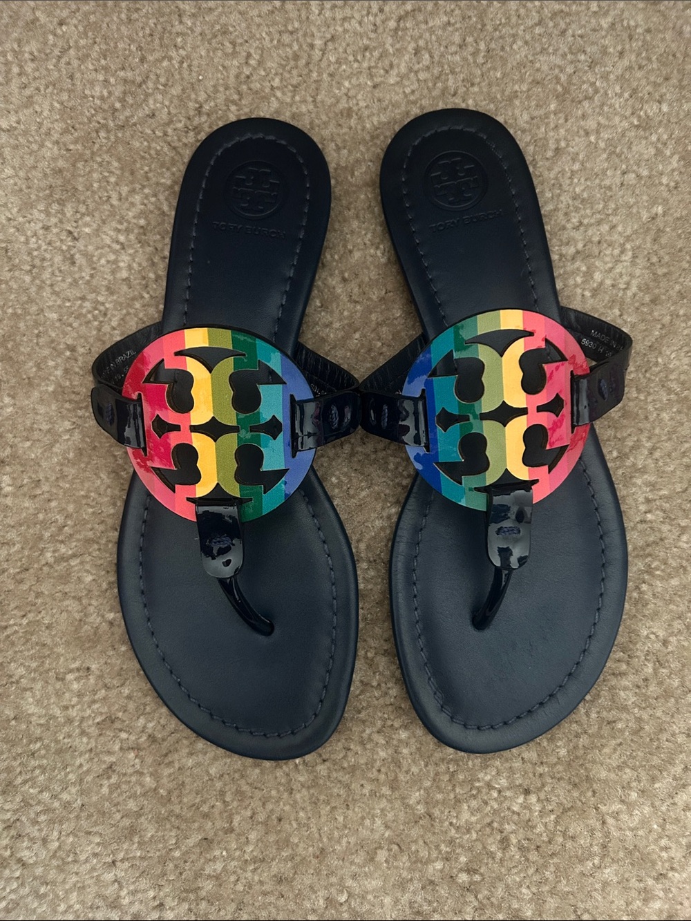 Tory Burch Kids Navy Flip Flops with Rainbow Logo Medallions
